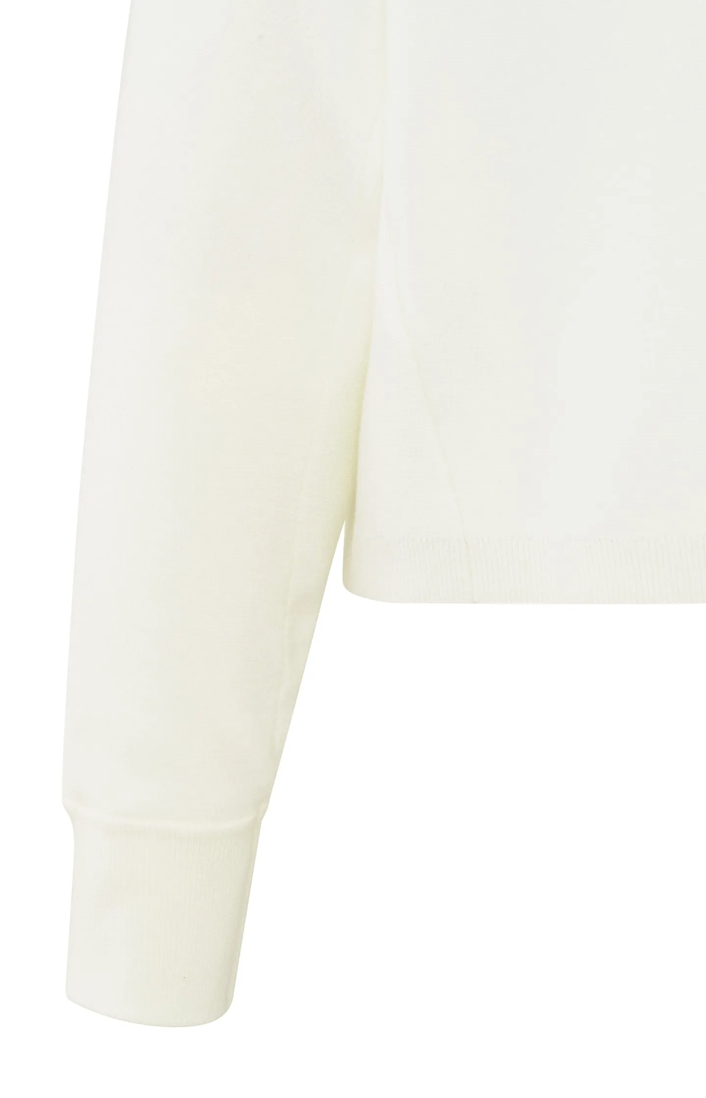 Cream-colored sweater with seam details and wide sleeves